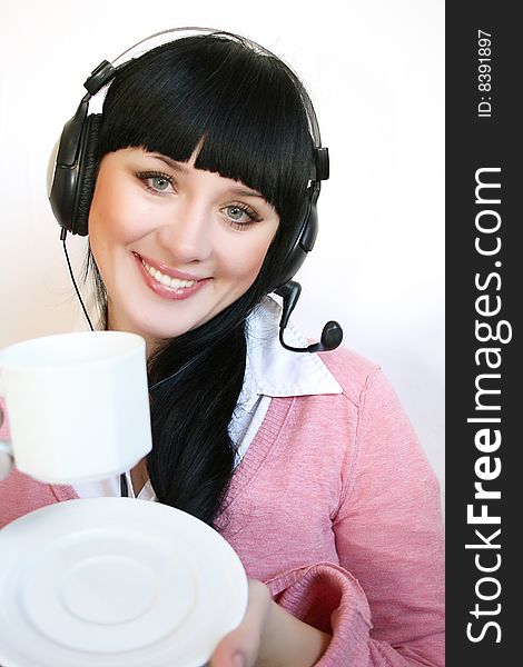 Business customer support operator woman with a cup of hot drink