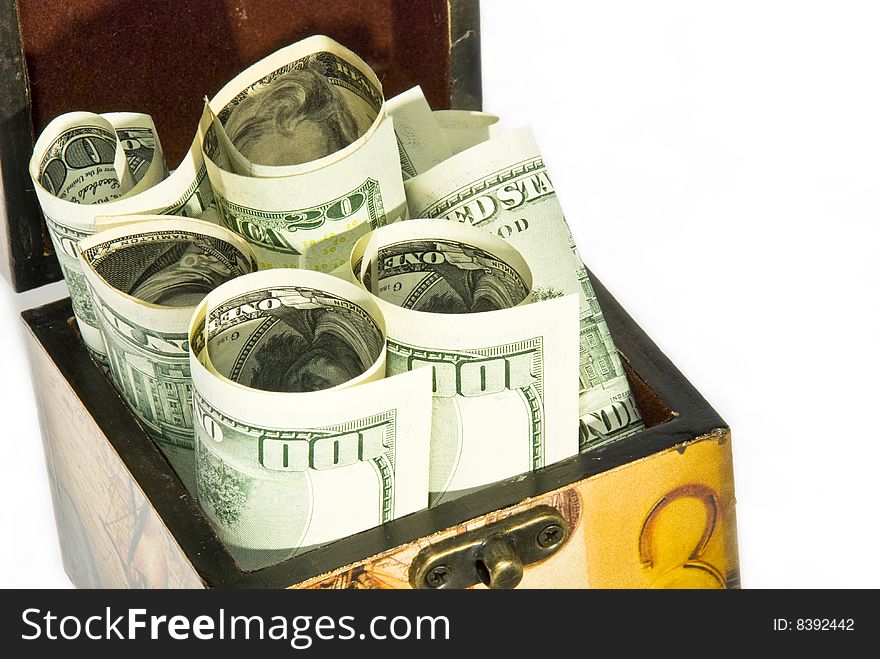 Brown chest full of  American dollars isolated in white background. Brown chest full of  American dollars isolated in white background