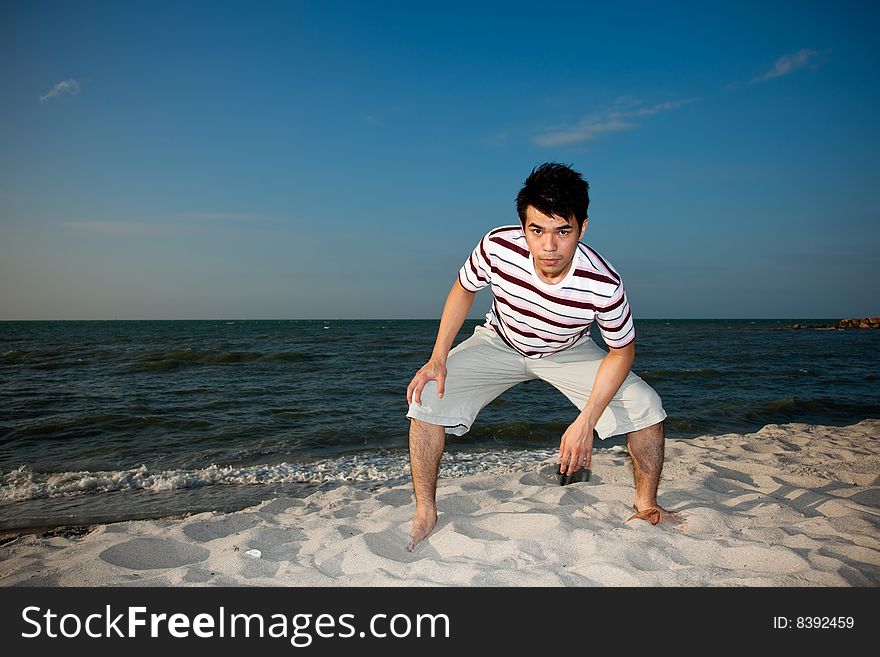 Young man by the beach