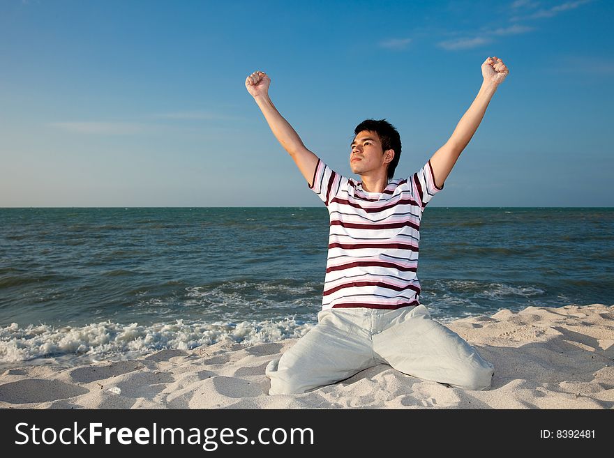 Young Man By The Beach