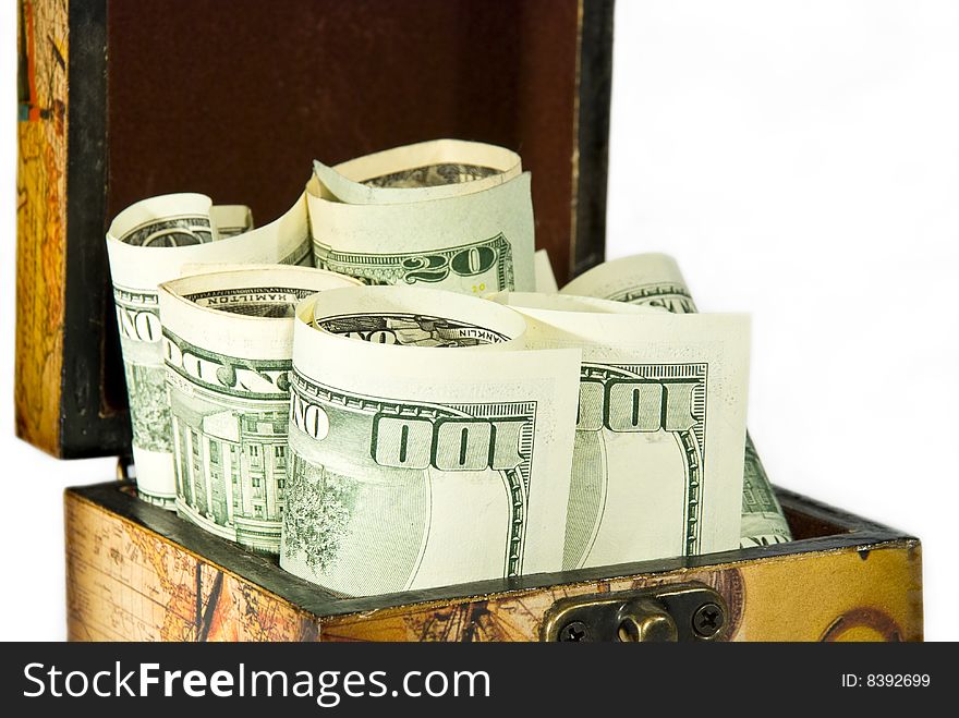 Brown chest full of American dollars isolated on white background. Brown chest full of American dollars isolated on white background