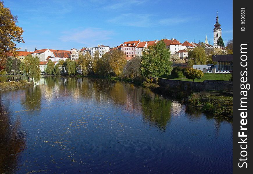 The old town Pisek on the river Otava with blue sky