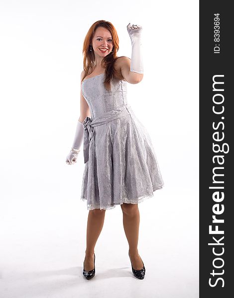 Young girl with white gloves standing on white background. Young girl with white gloves standing on white background