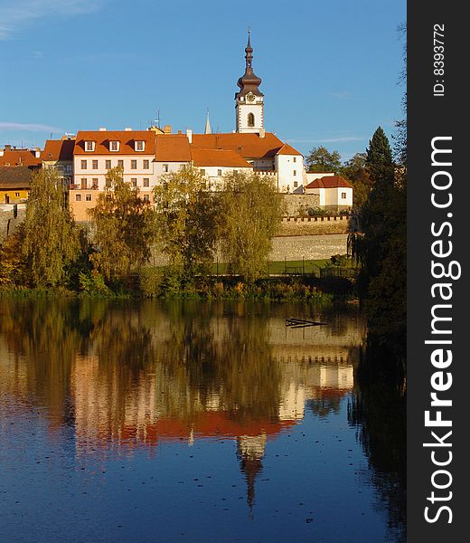 The old Czech town Pisek on the river Otava with blue sky