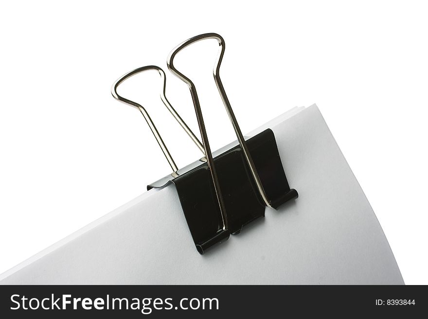 Block of paper attached with paperclip isolated on white background