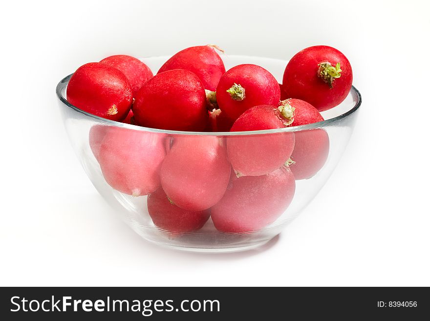 Plate of red radish vegetables isolated on white background