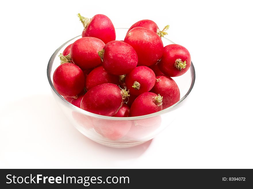 Plate of red radish vegetables isolated on white background