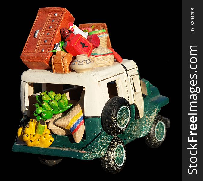 Colorfull model car with fruits and other objects. Colorfull model car with fruits and other objects