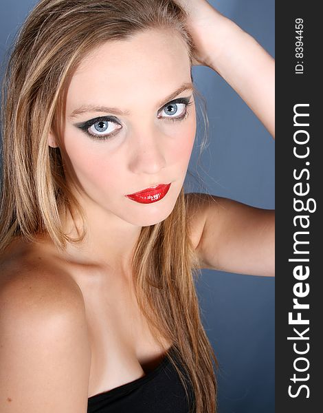 Beautiful young female model with dark make-up
