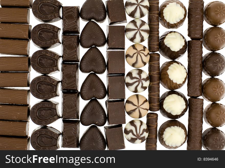 Chocolate sweets on white background