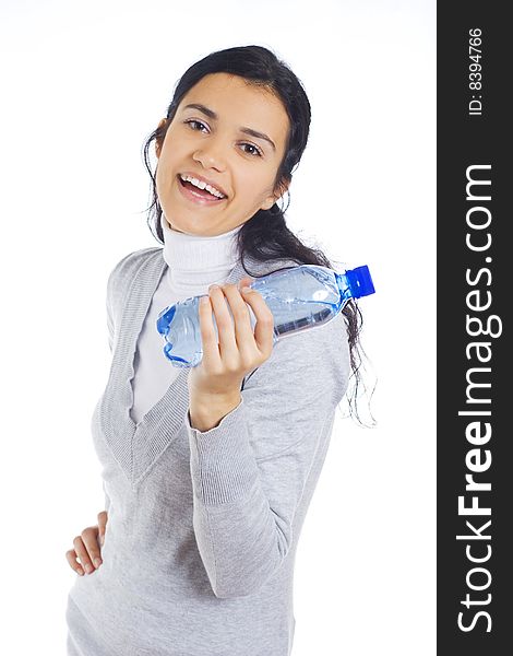 Young woman holding bottle with water