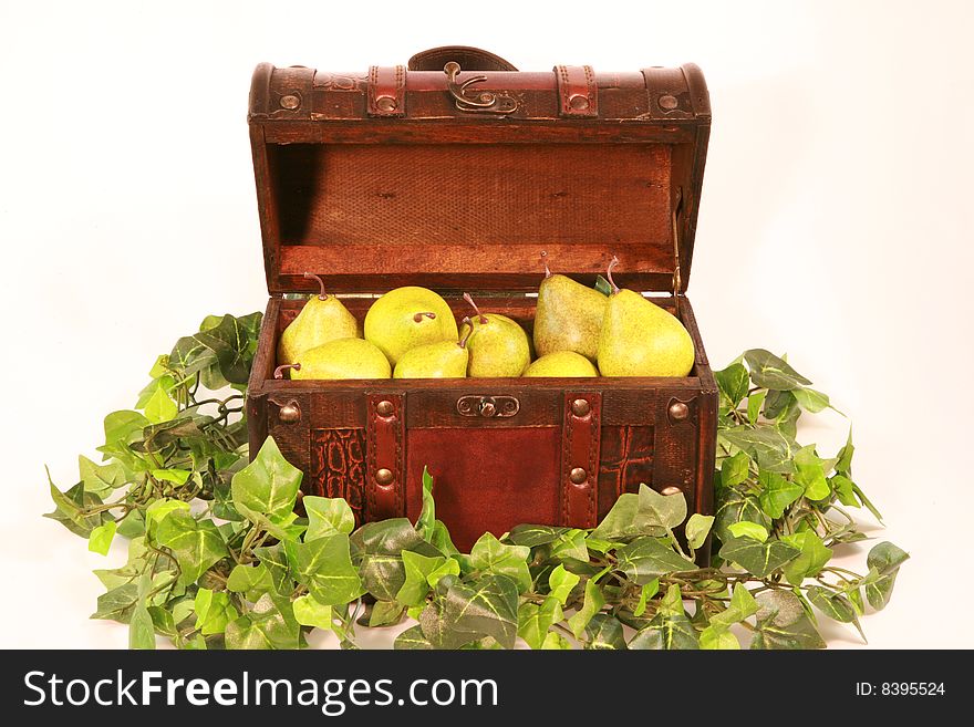 An array of pears in an old small chest. An array of pears in an old small chest