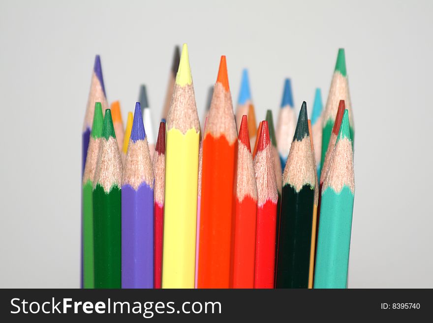 Color pencils arranged in a bundle.