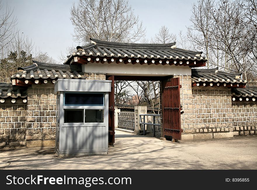 Asian Palace Gate with modern police box