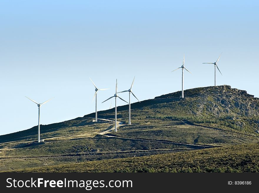 Wind energy - Field wind farm in the mountains. Wind energy - Field wind farm in the mountains