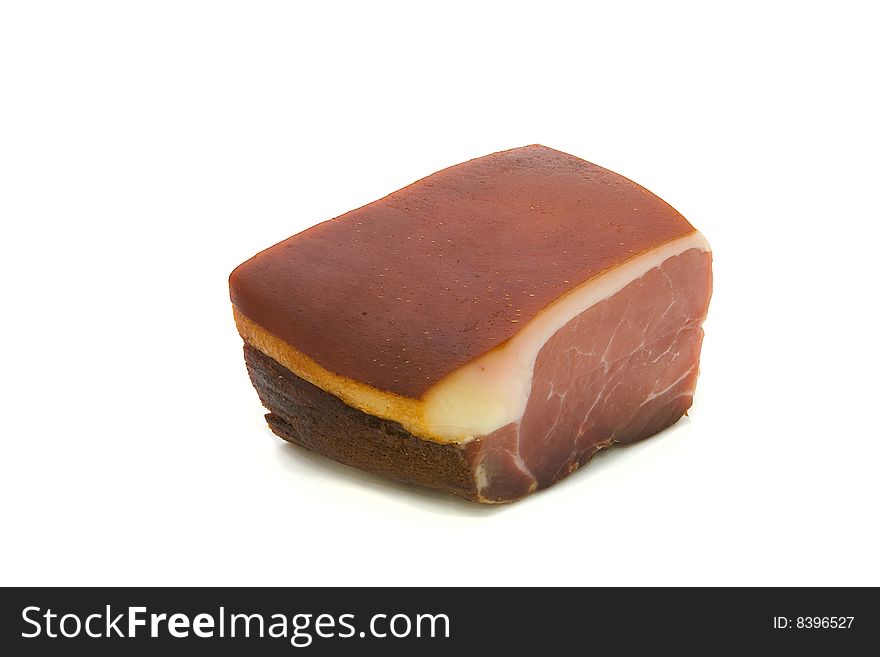 Piece of a ham on a white background. Isolated. Piece of a ham on a white background. Isolated