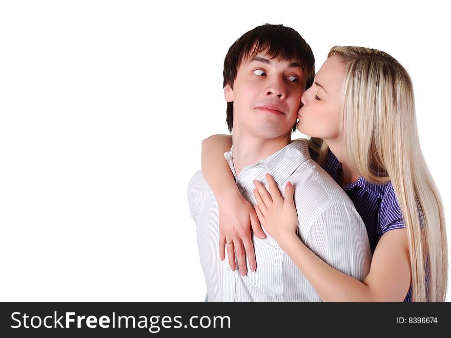 Young loving couple isolated at white background
