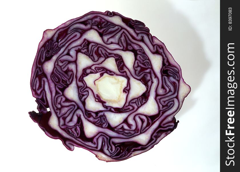 Cut red cabbage on a white background