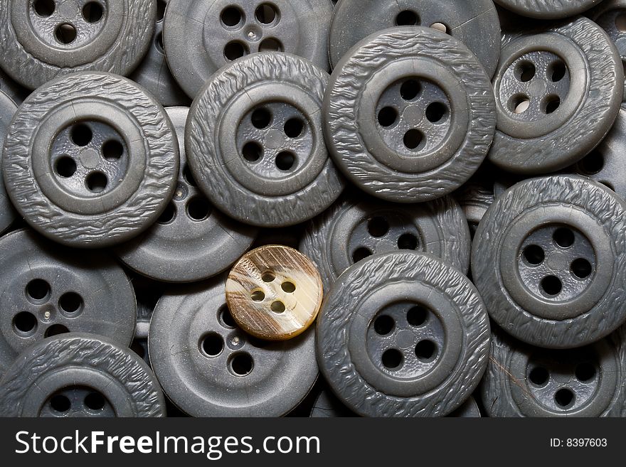 Old  grey buttons from a grandmother's stocking. Old  grey buttons from a grandmother's stocking.