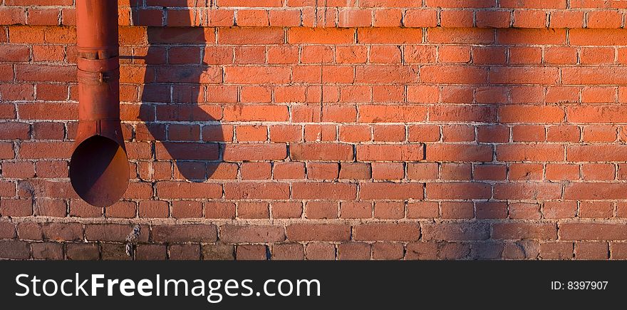 Brick red wall. Urban background. Brick red wall. Urban background.