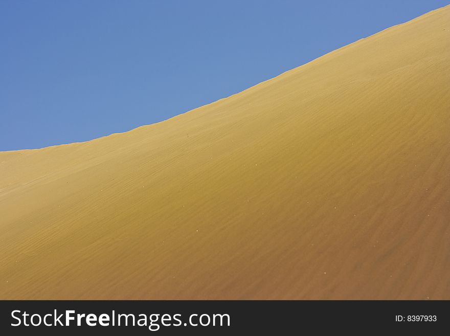 A photo of the warm texture of a desert. A photo of the warm texture of a desert.