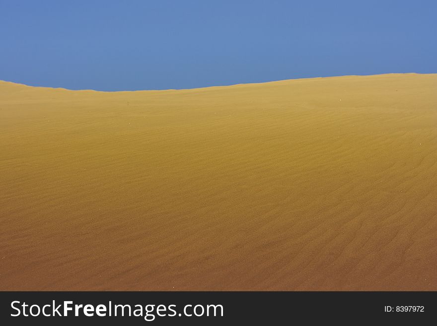 A photo of the warm texture of a desert. A photo of the warm texture of a desert.