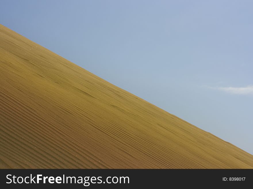A photo of the warm texture of a desert. A photo of the warm texture of a desert.