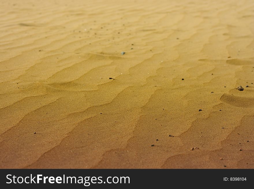 A photo of the warm texture of a desert. A photo of the warm texture of a desert.