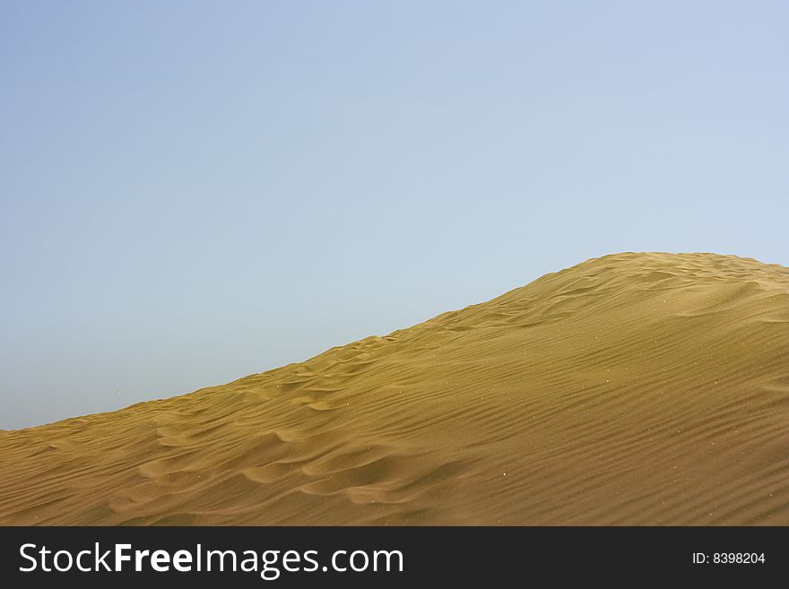 A photo of the warm texture of a desert. A photo of the warm texture of a desert.