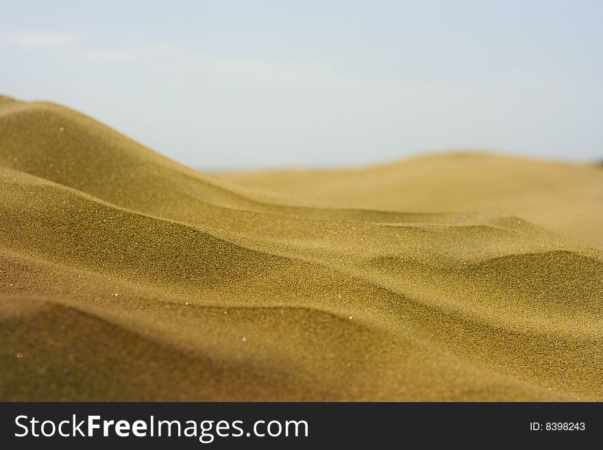 A photo of the warm texture of a desert. A photo of the warm texture of a desert.