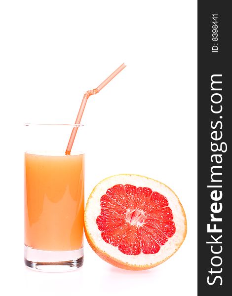 Grapefruit and juice in glass