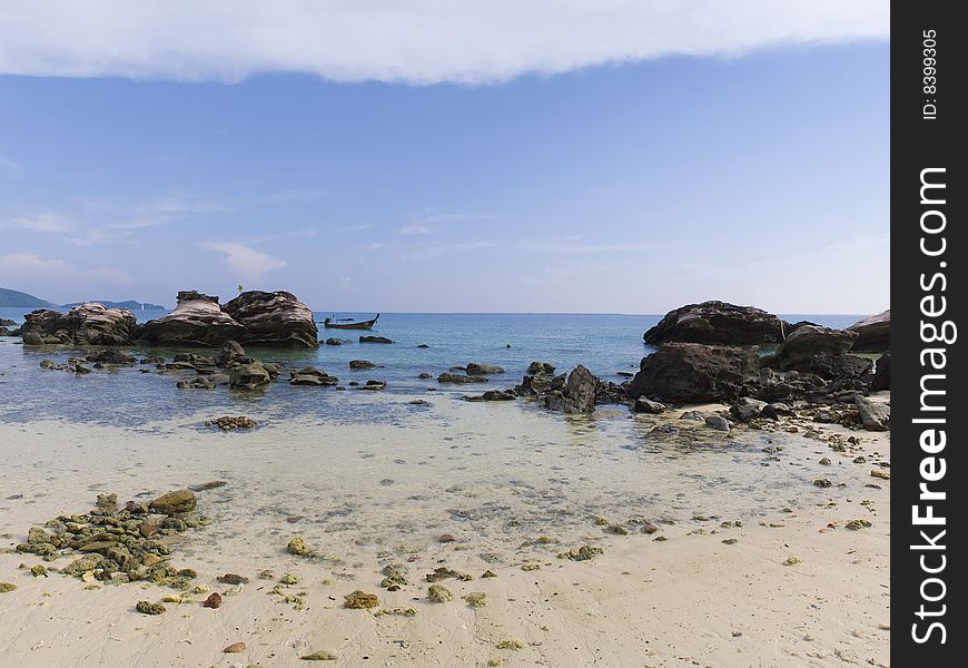 Boat between rocks