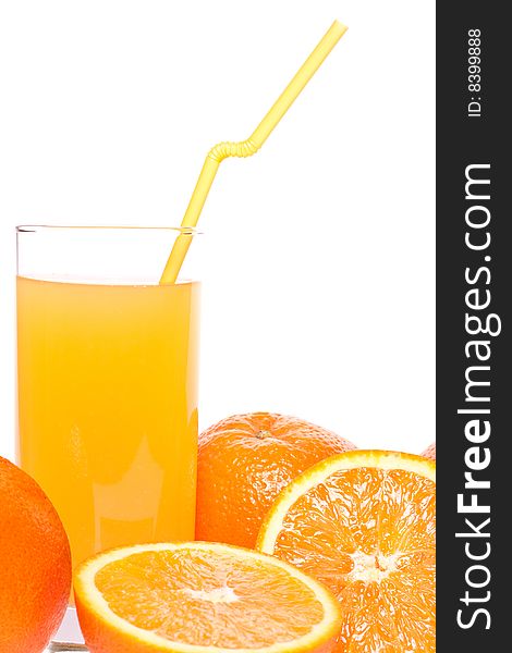 Orange and juice in glass on a white background