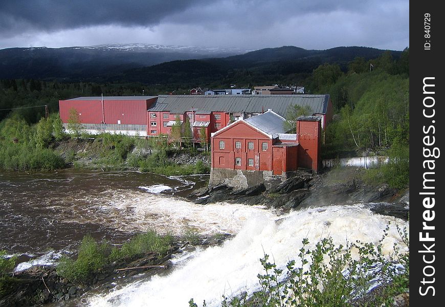 Old power station and waterfall