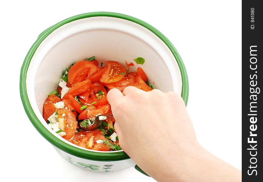 Preparing a tomato salad in pot. Preparing a tomato salad in pot