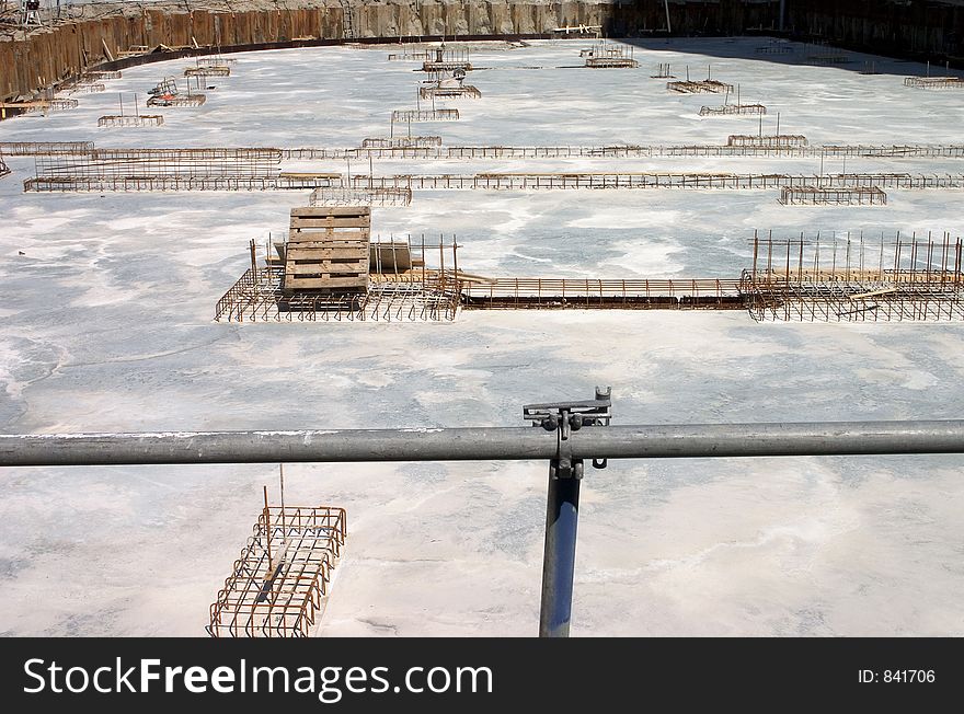 Construction site with freshly poored concrete and rebar