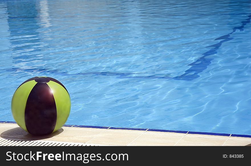 A ball near the pool. A ball near the pool