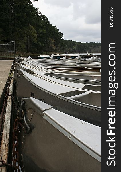 Paddle boats sitting on the dock. Paddle boats sitting on the dock