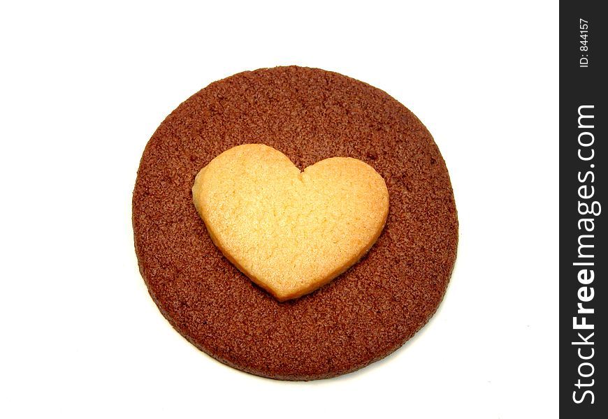 Heart biscuit over white background.