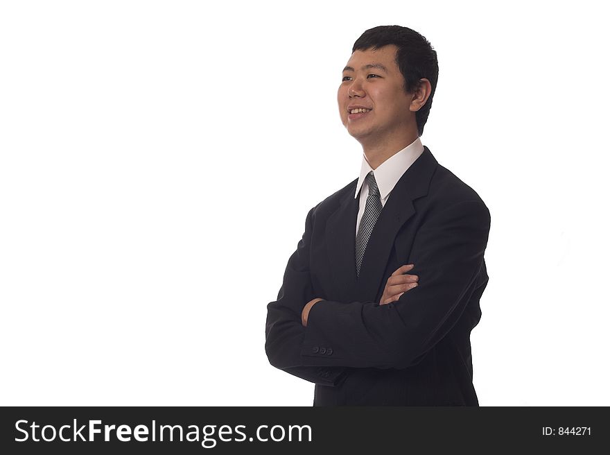 Young asian businessman smiling looking to the side, isolated
