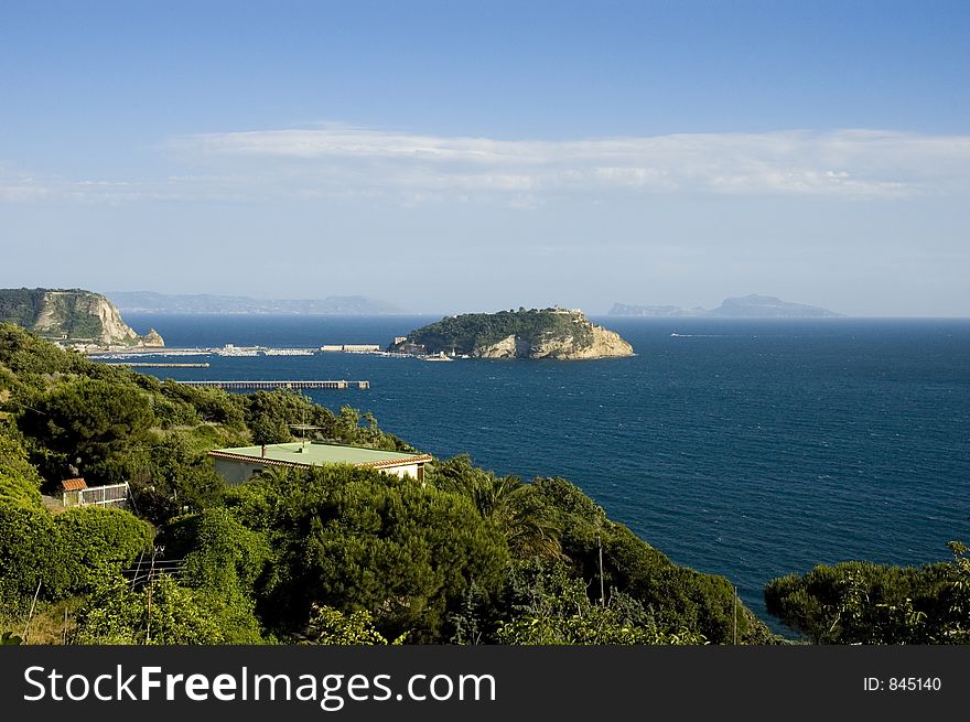 Nisida, a small island in the gulf of Pozzuoli (Napoli) and in background Sorrento peninsula and Capri island. Nisida, a small island in the gulf of Pozzuoli (Napoli) and in background Sorrento peninsula and Capri island