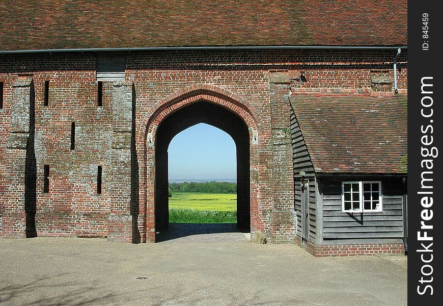 Old Archway with a view to fields beyond