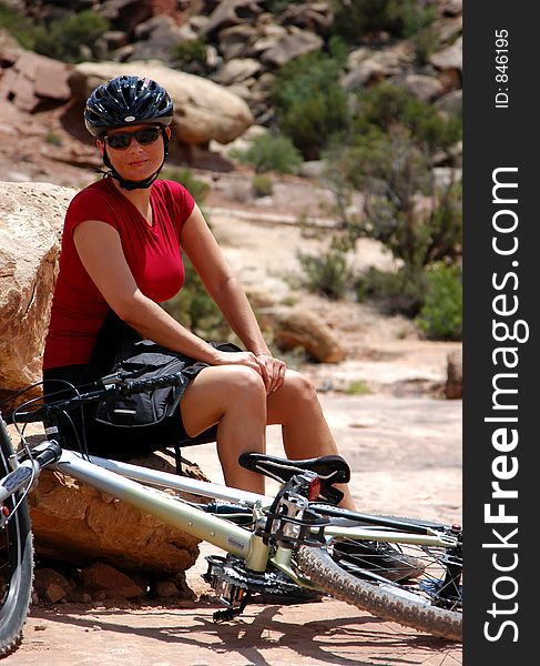Female mountain biker taking a rest