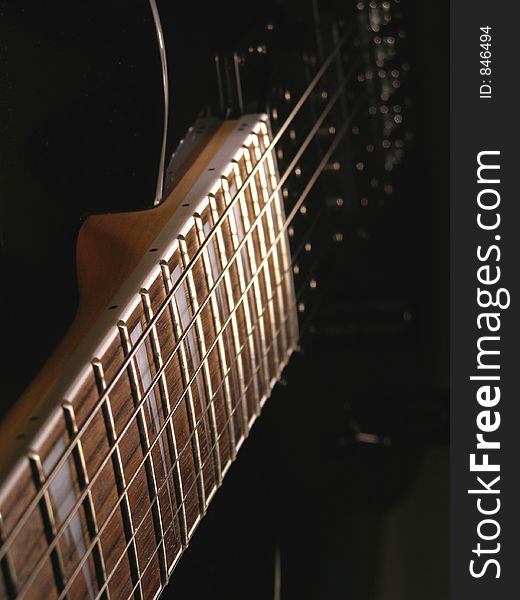 Guitar strings and neck close up. Guitar strings and neck close up