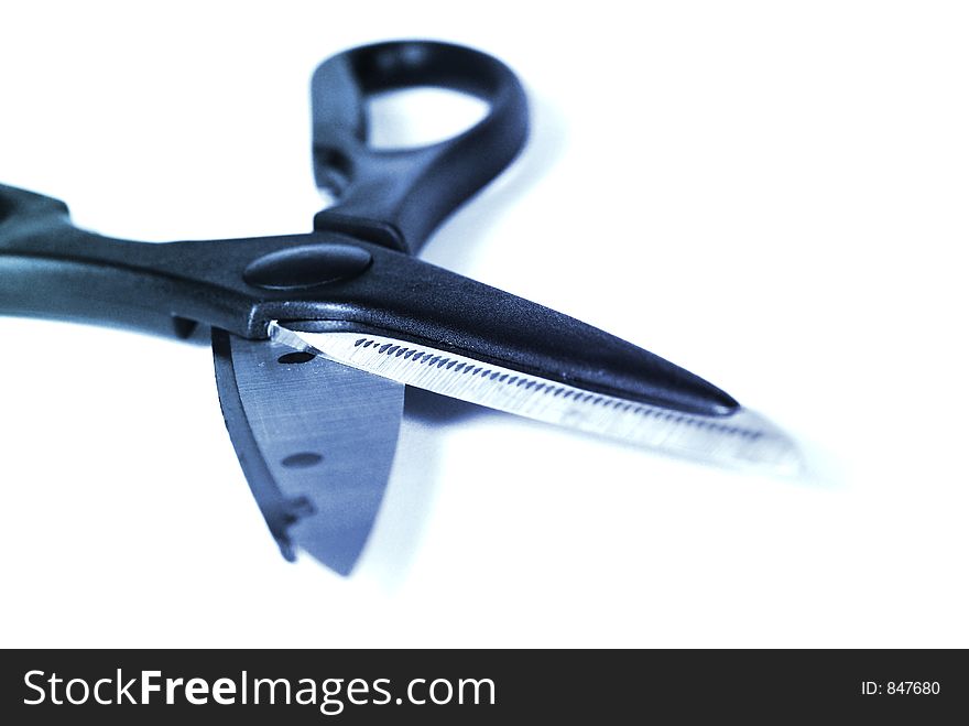 Cutting Edge of a scissors. Focus on the cutting edge, Intentional selective focus, shallow DOF. Object Shot