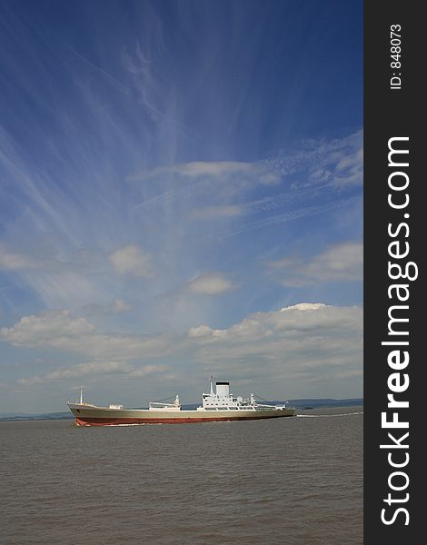 Ship leaving port going out to sea along the Severn estuary. Ship leaving port going out to sea along the Severn estuary