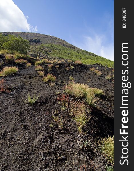 Images of Vesuvius volcano crater, it's rocks and active smokes