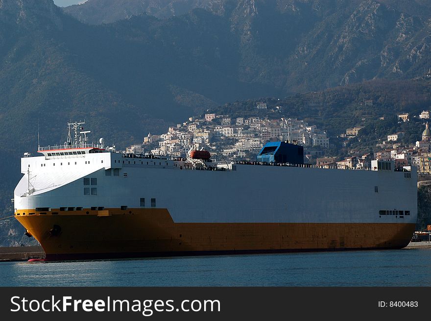 Cargo boat at dock waiting to leave the port