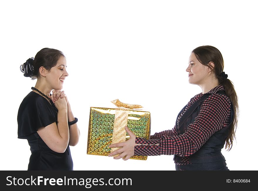 One girl make present to another (isolated on white)