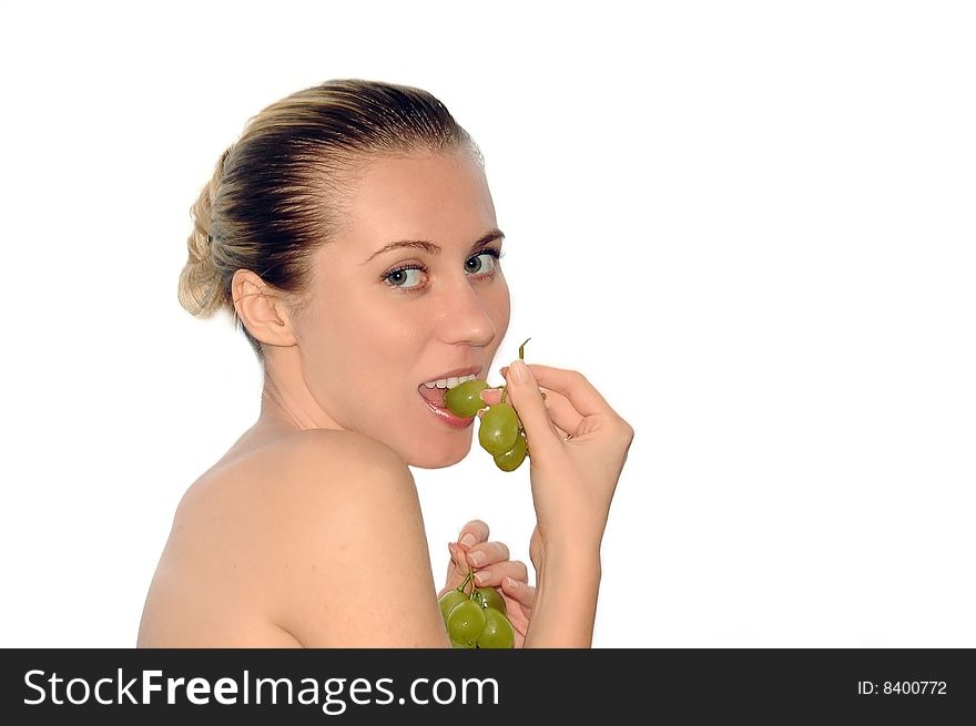 Portrait of sexy young women with beautiful face and green grapes. Portrait of sexy young women with beautiful face and green grapes